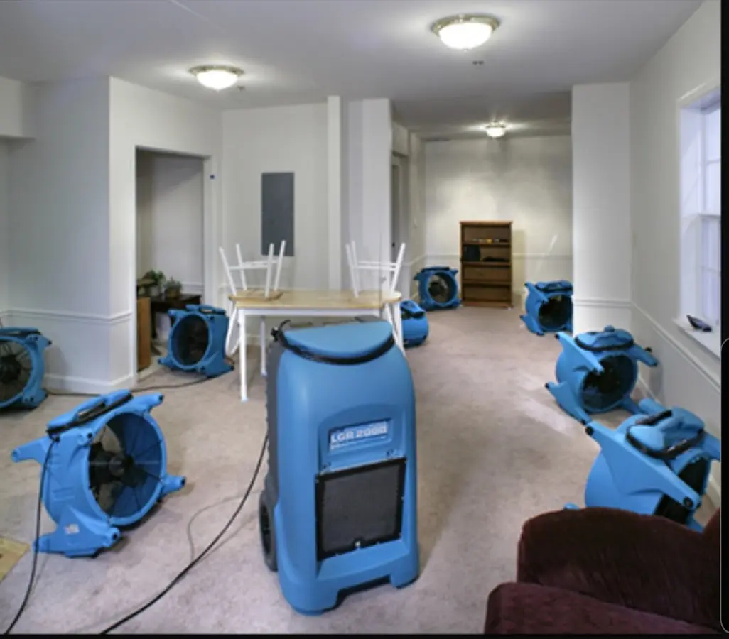 Air movers and dehumidifier setup for Water Damage Restoration in Irvington